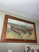 Full view of framed print hanging on wall