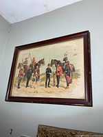 Full view of framed Canadian Forces print on wall