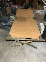 Top view of full cot showing canvas surface and dimensions