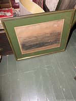 full view of framed print on floor
