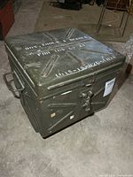 Top view showing stenciled text and latch