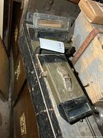 stack of periscope sight lenses and mirrored periscope housings