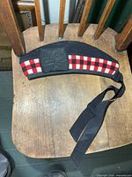 Full view of Glengarry cap on chair