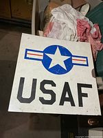 Front view of square USAF metal sign showing design and overall condition