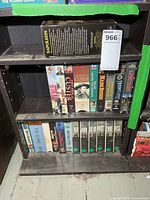 Full view of shelving with VHS tapes and Band of Brothers set