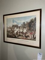 Full view of framed print on wall