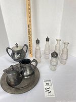 Group shot showing full tea set, tray, and six cruets for overview and condition