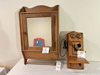 Cabinet and telephone full view