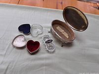 All three jewelry boxes displayed open with key and glass liners visible