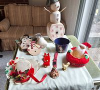 Overall view showing all Christmas decorations on table