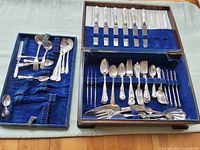 Open flatware chest showing full set