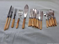 Full set of yellow-handled utensils laid out