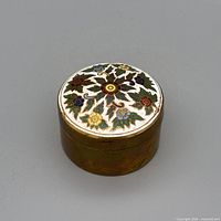 Top view showing enamel floral cloisonné design on lid