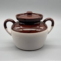 Front view showing bean pot, lid, two handles, color contrast