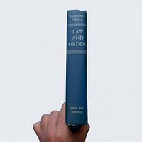 Spine of book showing title, author and publisher