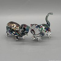 Side view of both glass animal figurines