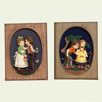 Both wall plaques front view