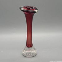 Full view showing ruby red neck and clear bubble base