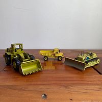 All three die-cast vehicles displayed together