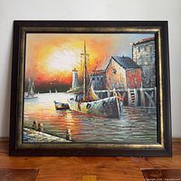 Full view of framed harbour boat scene painting
