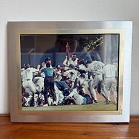 Front view of framed autographed photograph