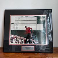Front view of framed Tiger Woods 1997 Masters photo plaque