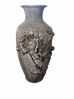 Full view of bronze vase showing high-relief peony and bird decoration