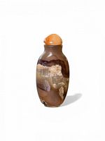 front view of agate snuff bottle showing natural stone banding and carnelian stopper