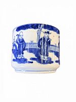 Front view showing two of the painted figures and fence detail, visible cracks