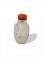 Front view of translucent fluorite snuff bottle with orange carnelian stopper