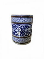 Front view of blue and white porcelain brush pot with figure and foliage decoration
