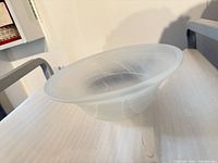 Side profile of frosted opal glass shade