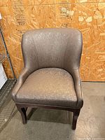 Front view of taupe fabric accent chair