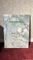 Front view of rectangular marble board showing overall size and veining