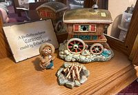 Group shot of Pendelfin caravan, campfire and Rocky Rabbit with original plaque visible