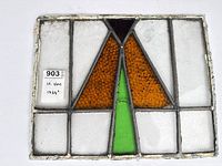 Front view showing full stained glass panel and dimensions tag