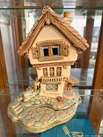 Front and right side view of Pendelfin Rabbit Castle Tavern building on stone base