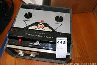 Front view of Webcor Compact Deluxe reel to reel recorder showing control panel, reels, knobs, and buttons.