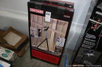 Two boxed Craftsman #922293 work stands stacked upright, showing front of boxes with product images and descriptions.