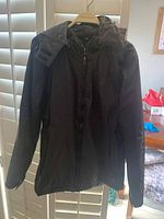 Full front view showing jacket design, hood and overall condition