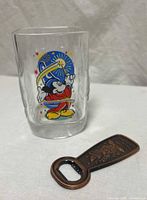 Glass and bottle opener side by side showing overall items