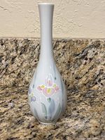 Full view of bud vase showing shape and floral design