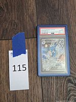 PSA-slabbed Kingdra ex card with lot tag visible