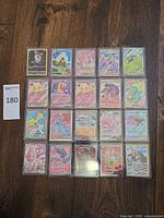 Grid layout of all 20 sleeved Pokémon cards