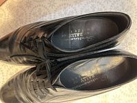 top view of both Bally shoes showing laces, insoles with branding