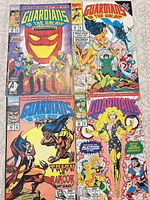 Four Guardians of the Galaxy comics laid out