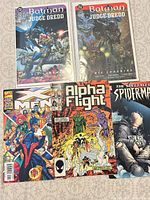 All five comic books laid out