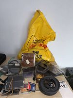 Overview of mixed camera filters, Cokin cases, adapter rings, CompactFlash cards and Kodak bag