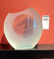 Front view showing frosted glass with clear circular window