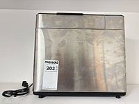 Front view of Hamilton Beach bread maker with power cord visible